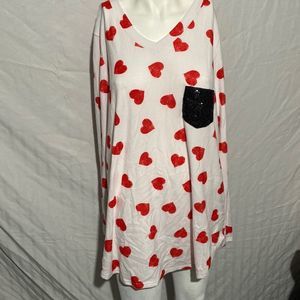 V-neck soft sweater white with red hearts and black sequins pocket.